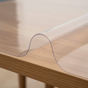 Průhledný ochranný ubrus na stůl z měkčeného PVC (tzv. měkké sklo) tl. 1,2mm, š.100cm (metráž)