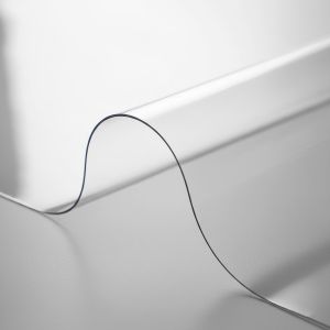 Průhledný ochranný ubrus na stůl z měkčeného PVC (tzv. měkké sklo) tl. 1,2mm, š.100cm, role 15m